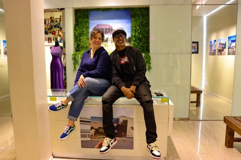 Sarah Mejia, left, and photographer Zaved Khan pose inside the Sacramento Rewind exhibit at Arden Fair Mall on Friday, Dec. 12, 2025. Mejia curated the exhibit’s vintage clothing displays while Khan created the photographic installations.