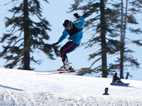 A skier makes a jump at the Sierra At Tahoe ski resort near Echo Summit , Calif., Thursday, Jan. 30, 2020.