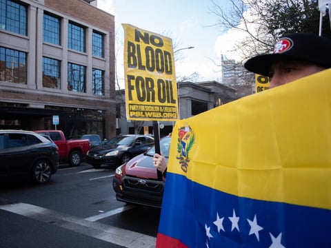 Several dozen demonstrators gathered on the corner of 16th and J Saturday, Jan. 3, 2026, in downtown Sacramento as part of a nationwide day of demonstrations opposing U.S. military intervention in Venezuela.