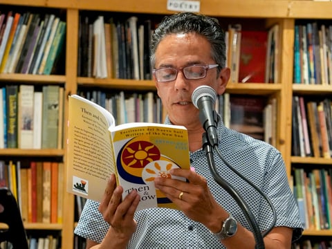 Marco Antonio Contreras reads an excerpt from “Then & Now” during a book release event at the Sacramento Poetry Center on Saturday, Sept. 20.