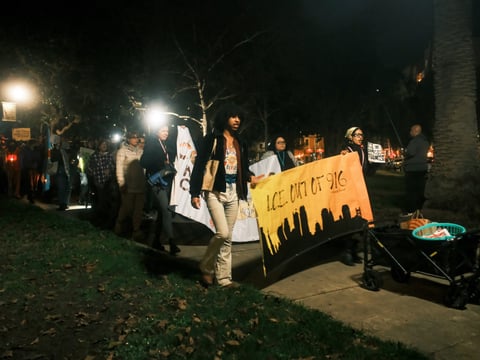 Protesters march from Fremont Park to the John E. Moss Federal Building on Wednesday, Jan. 7 2026.