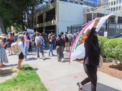 Protesters outside of the John Moss Federal Building at 650 Capitol Mall in Sacramento, Thursday, June 12, 2025.