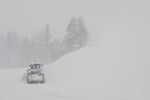 A road is cleared during a snow storm on Wednesday, Feb. 18, 2026 near Soda Springs, Calif.