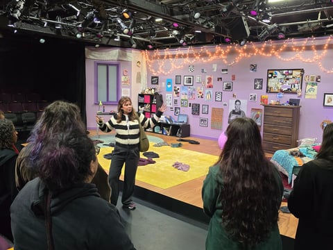 916 Ink students take a backstage tour before reciting their work in the opening of a performance of “I and You” at Capital Stage.