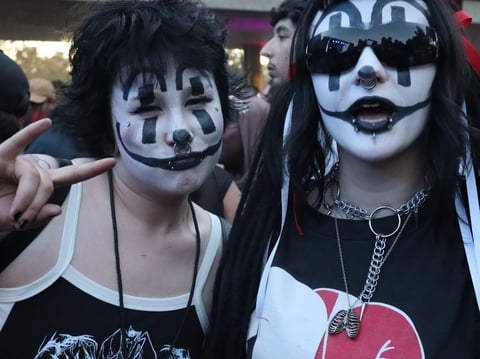 Festival attendees Hayley and Spencer in their Juggalo face paint ahead of the Insane Clown Posse set at Aftershock  in 2024.