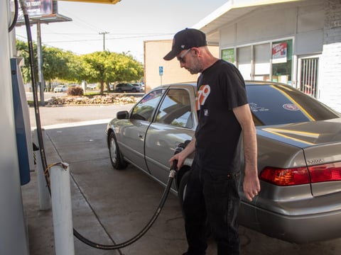 Kevin Mannion fills up his 2000 Toyota Camry Friday, March 20, 2026, at CJ Gas in Sacramento.