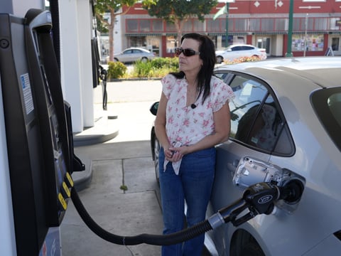Leslie Sherman-Shafer, an Uber driver, fills up her car at a gas station in Alameda, Calif, March 23, 2026.