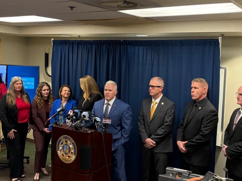Yolo County District Attorney Jeff Reisig (center) and members of his team speak at a news conference Friday, April 10, 2026, in Woodland, Calif., announcing indictments charging eight people in connection with the deadly July 2025 Esparto explosion.