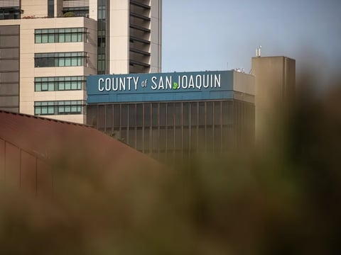 A County of San Joaquin sign on the top of a building in downtown Stockton on March 26, 2026. Photo by Larry Valenzuela, CalMatters