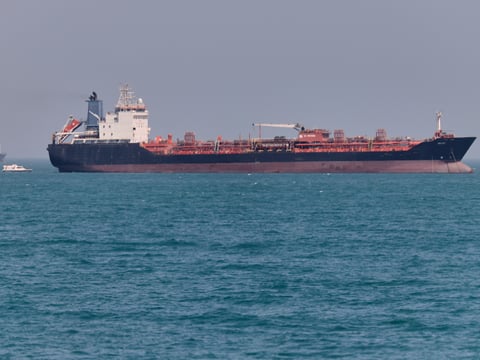 An oil tanker sits at anchor in the Strait of Hormuz off Bandar Abbas, Iran, Saturday, May 2, 2026.