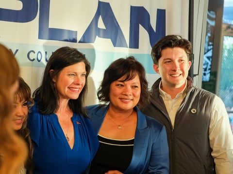 City councilmember Lisa Kaplan poses with supporters on election night. June 2, 2026.