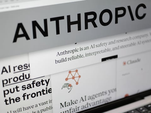 FILE - Pages from the Anthropic website and the company's logo are displayed on a computer screen in New York, Feb. 26, 2026.