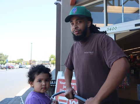 Isaiah Stone finished up a shopping trip with his 2-year-old daughter Tuesday, June 23, 2026. He tries to be selective when he goes to the grocery store. “I try not to just go all out,” he said.