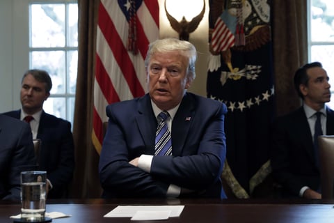President Trump speaks during a meeting with bank executives at the White House on Wednesday. He is giving an address on coronavirus Wednesday evening.