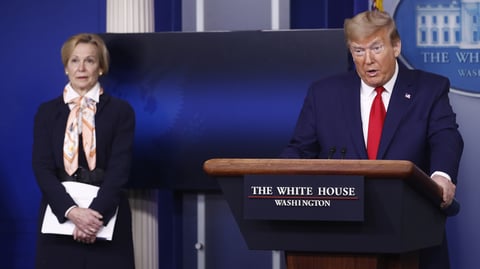 President Trump speaks during a coronavirus task force briefing at the White House on April 18, 2020. White House coronavirus response coordinator, Dr. Deborah Birx, stands at left.