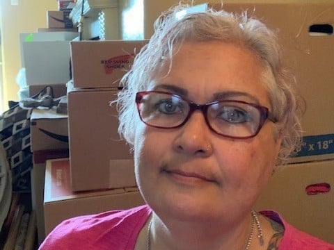 Merry Collins has been fighting COVID-19 and the threat of eviction at the same time. She's been boxing up her belongings in her Dallas apartment and worries she could be evicted soon. "I'm scared," she says.