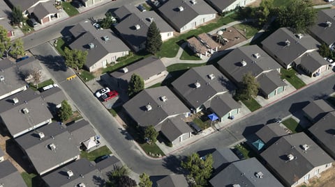 Lawmakers in California say the state's pattern of single-family zoning is boosting carbon emissions.