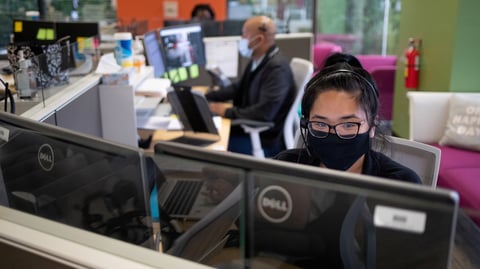Harris County Public Health contact tracers are seen at work as they try to help stop the spread of the coronavirus outbreak in Houston, Texas, on July 22.