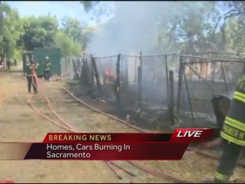 Firefighters battle a blaze early Thursday evening on Stockton Boulevard near 21st Avenue.