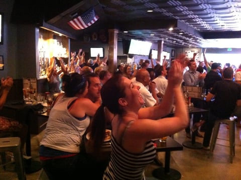 Lilli Bewley, Troy Haymie, and Kristen Lehr celebrate a U.S. goal during the team's match vs Belgium.