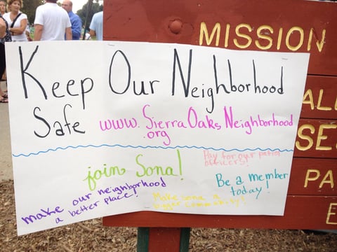 “Keep Our Neighborhood Safe” sign at Sierra Oaks Night Out event in Oak Meadow Park Tuesday night.