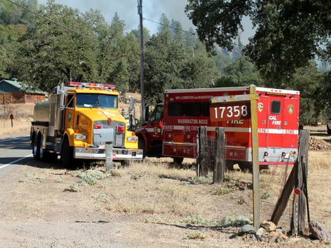 Fire crews at the Dog Bar Fire in Nevada County Saturday afternoon.
