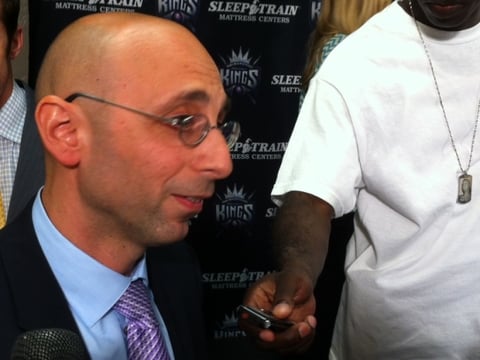 Pete D'Alessandro talks with reporters at the Sacramento Kings' media room at Sleeptrain Arena.