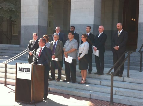 Business groups urge Gov. Jerry Brown to veto a bill that would make California employers liable for their subcontractors' wage theft and workers compensation violations at a Capitol news conference Monday.