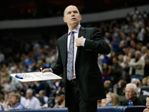 Sacramento Kings head coach Michael Malone calls for a time out late in the second half of an NBA basketball game against the Dallas Mavericks, Friday, Jan. 31, 2014, in Dallas. 
