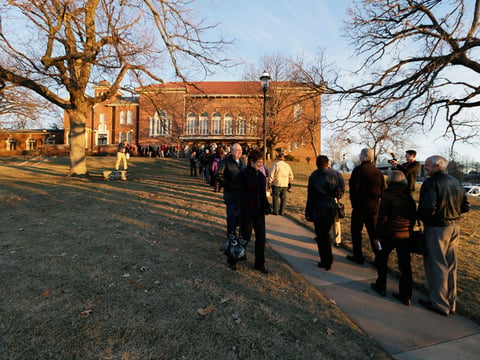 Attendees wait for the doors to open before the Freedom Summit, Saturday, Jan. 24, 2015, in Des Moines, Iowa. Several potential 2016 presidential hopefuls are scheduled to speak at the event.
