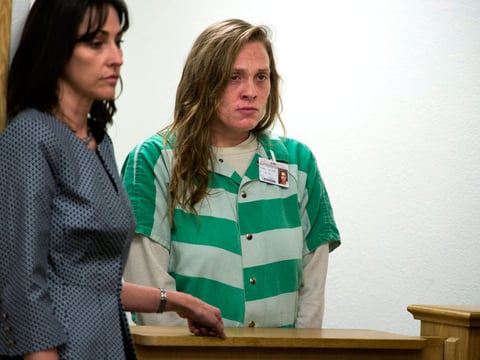 Yolo County public defender Tracie Olsen, left, stands with Samantha Green, the mother of an infant found dead near the Sacramento River, as she is arraigned on the child's death on Wednesday, March 4, 2015, in Woodland, Calif.