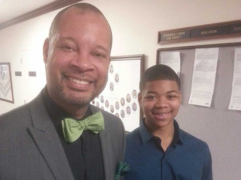 Nevada State Sen. Aaron Ford, with his son, Aaron Ford II, at the state legislature Thursday, March 12, 2015. 