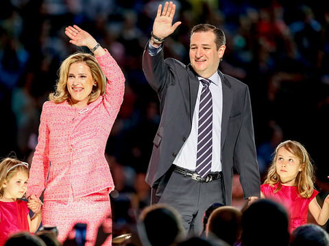 Sen. Ted Cruz, second from right, R-Texas, his wife Heidi, and their two daughters Catherine, left, 4, and Caroline, 6, wave on stage after he announced his campaign for president, Monday, March 23, 2015.