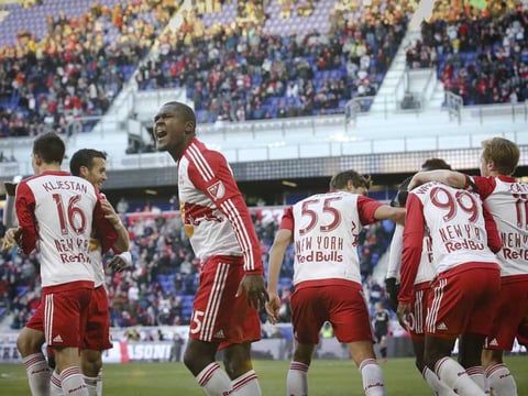 New York Red Bulls defender Chris Duvall, third from the left, reacts toward the crowd after teammate Lloyd Sam scores during the second half of an MLS soccer game against D.C. United on March 22, in Harrison, N.J. The Red Bulls won 2-0.