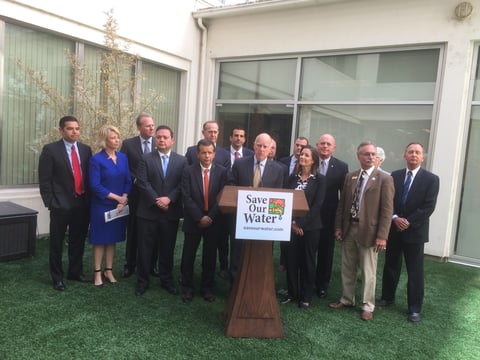 Gov. Jerry Brown announces proposed legislation that would give more authority to local water agencies last week at the state Capitol.
