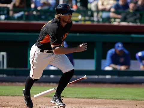San Francisco Giants' Hunter Pence (8) hit during a spring training baseball game against the Chicago Cubs, Thursday, March 5, 2015, in Scottsdale, Ariz. 
