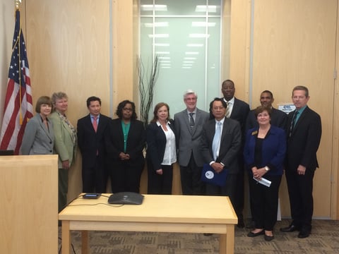 Representatives of education advocacy groups - including the California Teachers Association and the California School Boards Association - pose for a photo after a news conference Monday in Sacramento.