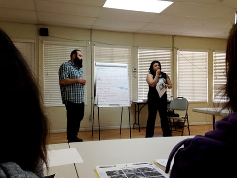 Facilitators Onniel  Sanchez (left) and Martina Lepannen (right) lead a parenting class through the Mutual Assistance Network at the Arcade Community Center.
