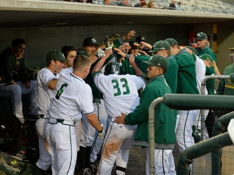 Sacramento State's Nathan Lukes is mobbed by teammates after hitting a home run against rival UC Davis May 5. Lukes ended the year as Sac State's all-time leader in hits.