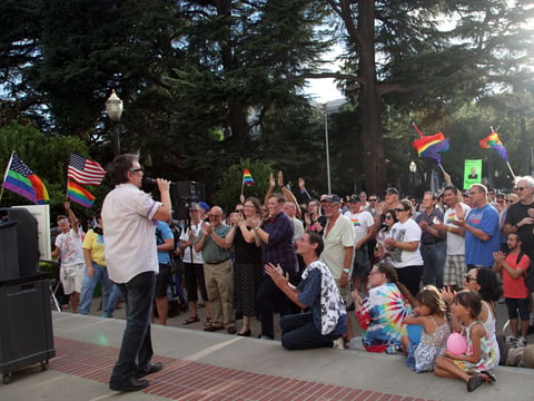 A crowd celebrates the U.S. Supreme Court's decision Friday, June 26, 2015 at the state Capitol. 
