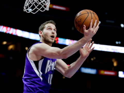Sacramento Kings guard Nik Stauskas shoots during the second half of an NBA basketball game against the Los Angeles Clippers in Los Angeles, Saturday, Feb. 21, 2015.