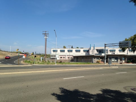 Fencing around an empty building is currently at the northwest corner of the proposed five-acre development on Stockton Boulevard between T and the U.S. 50 eastbound onramp.