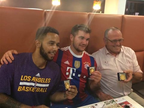 Three men who helped to disarm an attacker on a train from Amsterdam to France, from left to right, Anthony Sadler, Alek Skarlatos and Chris Norman, a British man living in France, pose with medals they received for their bravery.