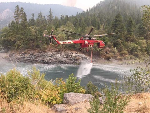 Heavy helicopter dipping on the Gasquet Complex Fire, Saturday, Sept. 12, 2015. 