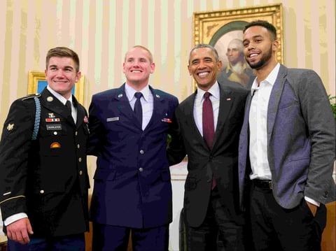 President Barack Obama poses for a photograph with Oregon National Guardsman, from left, Alek Skarlatos Air Force Airman 1st Class Spencer Stone, and Anthony Sadler, in the Oval Office of the White House in Washington, Sept. 17, 2015.