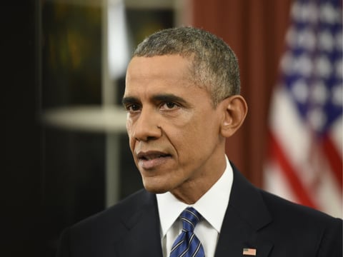 President Barack Obama addresses the nation from the Oval Office at the White House in Washington, Sunday night, Dec. 6, 2016.