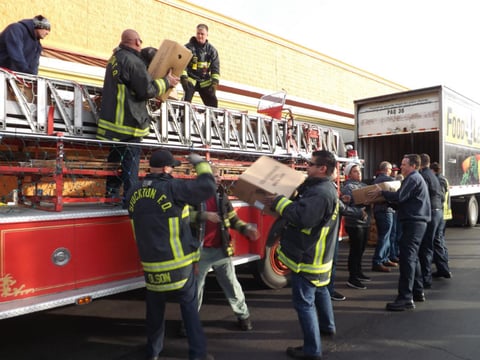 Fire engine with Santa aboard which travelled from Food4Less to Stockton Emergency Food Bank.