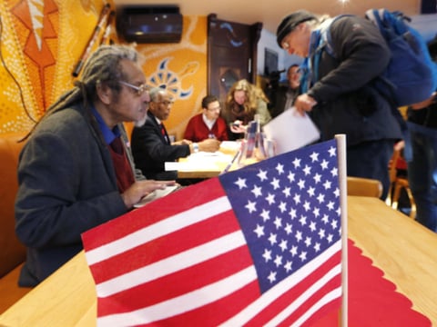 US Democrats living in Germany cast their ballots at a polling station in a restaurant in Frankfurt, Germany, Tuesday, March 1, 2016. The United States have their presidential primary elections on so-called Super Tuesday.