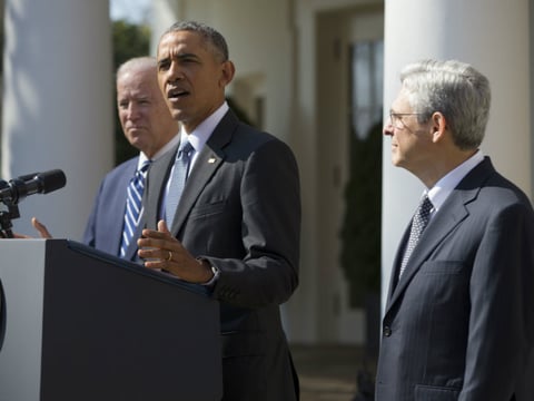 Federal appeals court judge Merrick Garland, right, stands with President Barack Obama as he is introduced as Obama’s nominee for the Supreme Court during an announcement in the Rose Garden of the White House on March 16, 2016 in Washington.
