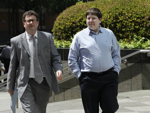 In this April 23, 2013 file photo, Matthew Keys, right, walks to the federal courthouse for his arraignment with his attorney Jason Leiderman, in Sacramento, Calif. 